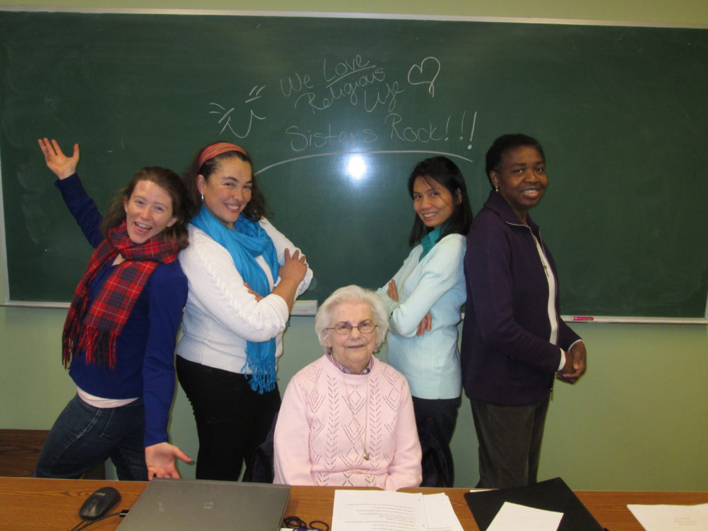 Aquinas students post with Sister Regina